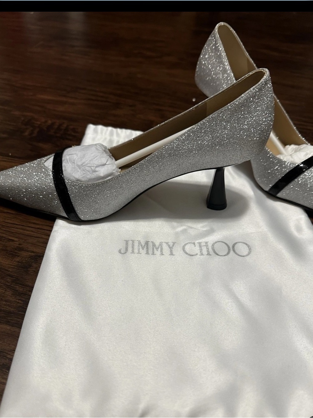 Jimmy Choo Silver Glitter Pointed Pumps with Black Accent